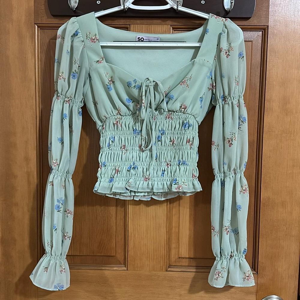 green ruffle sleeve top